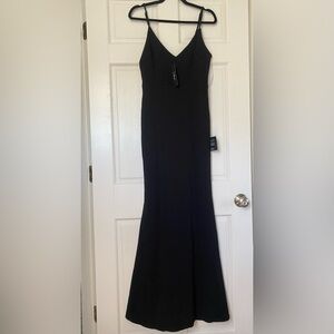 Lulu’s black tie floor length evening gown.